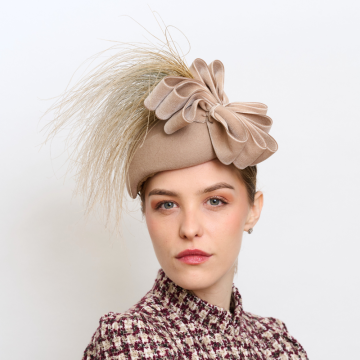 V V Chapeaux Ripe wheat felt percher hat with mock peacock wisps and double velvet bow detail.