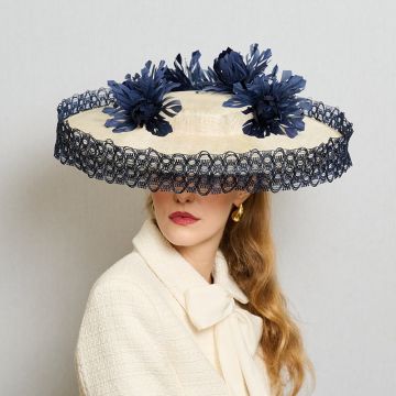V V Chapeaux Clotted Cream sinamay Ascot saucer hat with vintage raffia lace and hand-cut feather flower detailing.