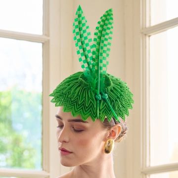 A V V Chapeaux Emerald Panama straw percher hat with hand-pleated satin and two Emerald checkered goose feathers.
