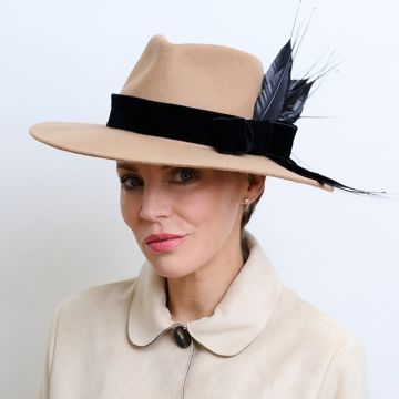 V V Chapeaux Arabian Sandstorm Italian wool felt trilby hat with black hand-cut spiky feathers and black velvet band and bow.