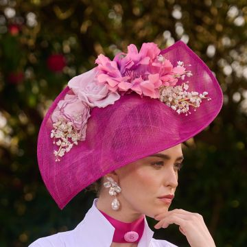 A V V Chapeaux Old Fuchsia sinamay wave hat with vintage flowers in Rose Pink, Old Azalea and Old Fuchsia with Lily of the Valley buds.
