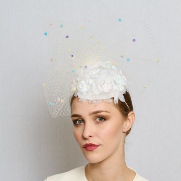 A V V Chapeaux White bridal percher hat with vintage flowers and veiling. 